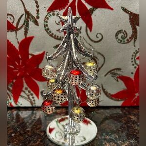 Festive Silver Holiday Tree with Red and Gold Accents